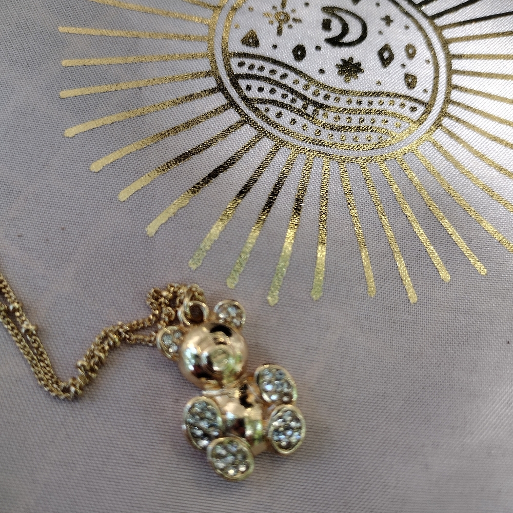 Gold teddy bear.